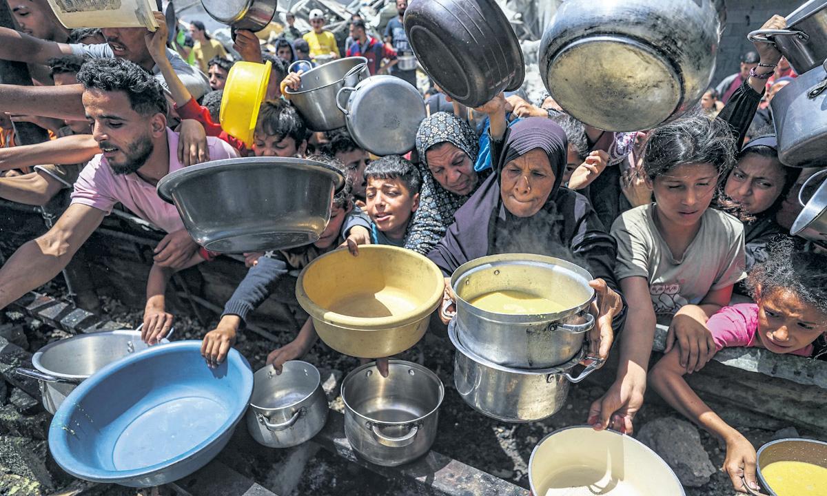 Boss of US-backed Gaza aid group resigns, citing independence concerns