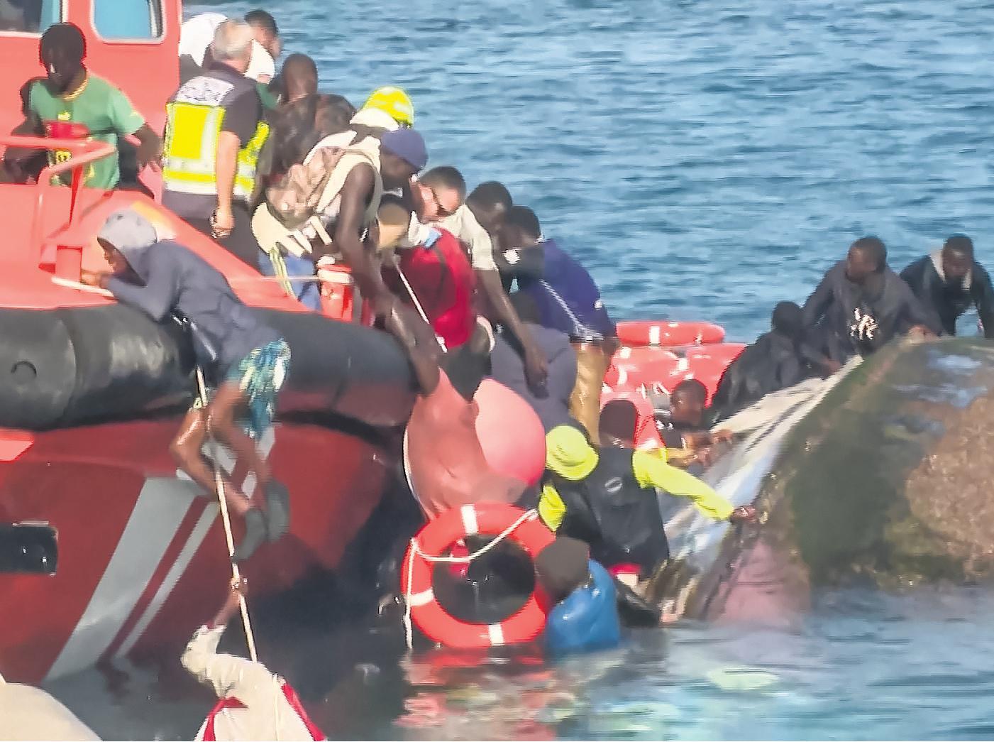 Four women and three girls die as Canary Island migrant boat capsizes