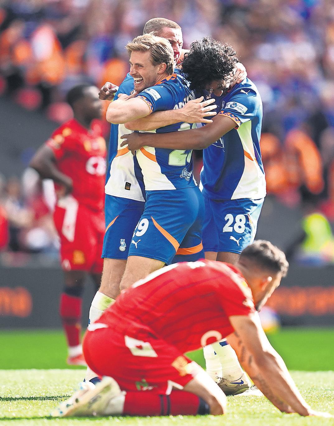 'Massive' day of drama for Latics as Harratt ends three-year exile