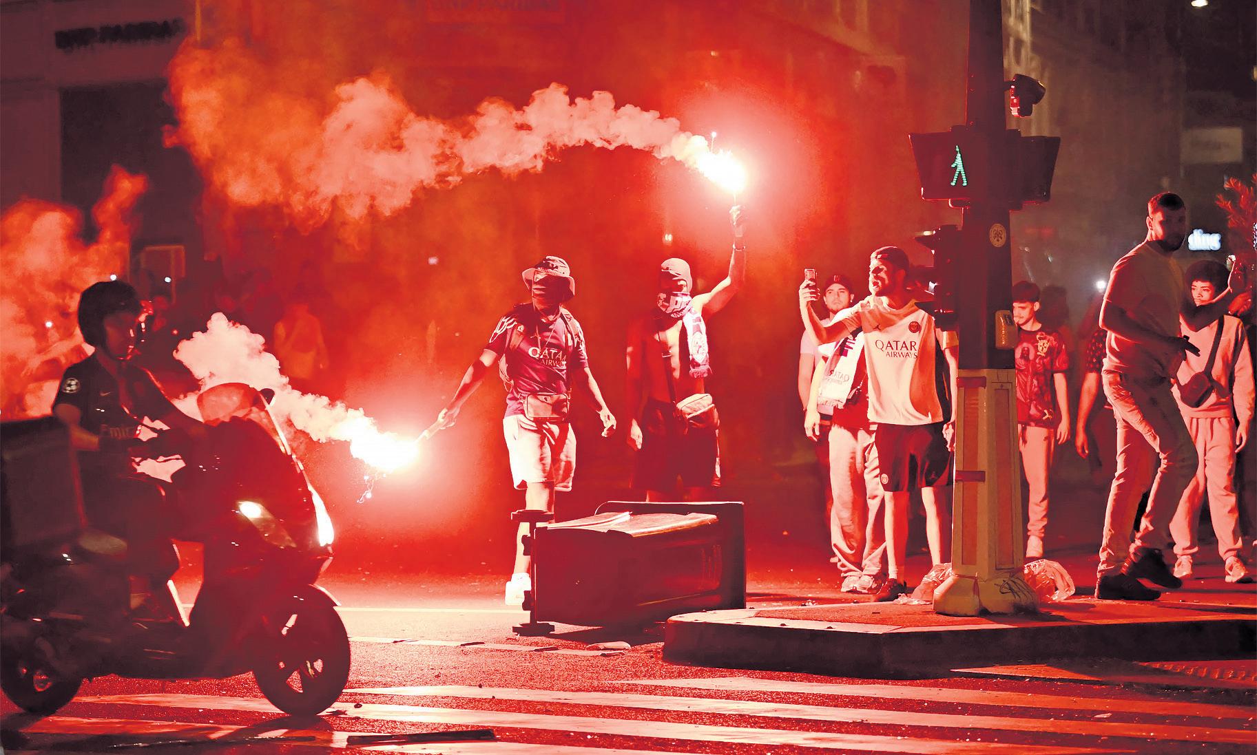 Two die and hundreds arrested after PSG win Champions League final