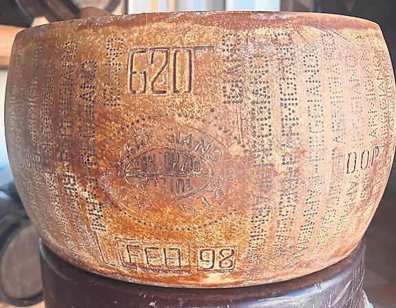 Blessed are the cheesemakers: Oldest wheel of parmesan is a 'jewel of nature'