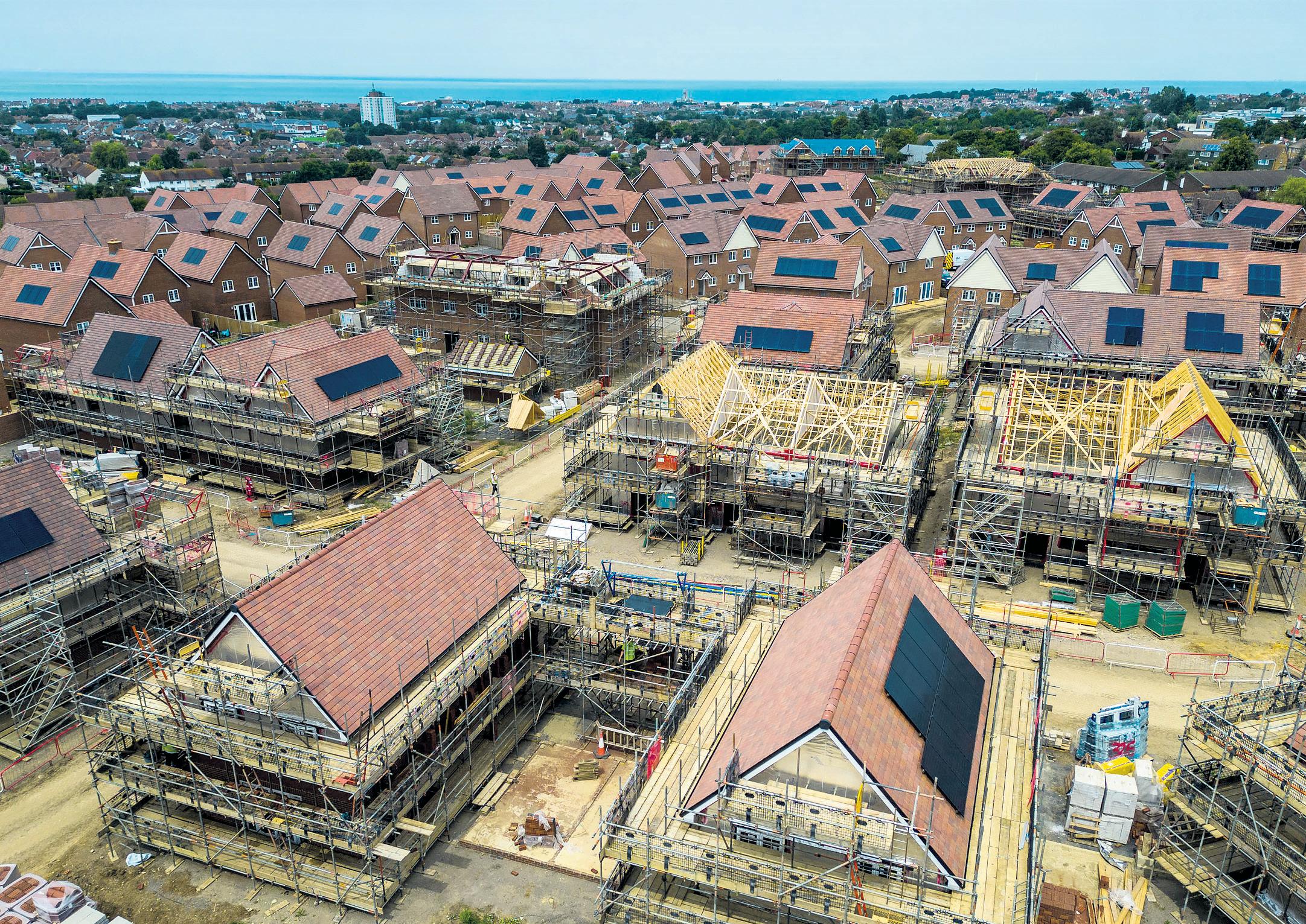 Housing boom Builders tool up to hit the government's targets