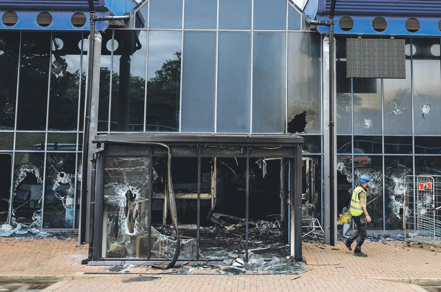 Northern Ireland minister accused of stirring up racial tensions refuses to resign