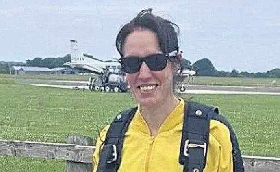 Tributes paid to 'selfless' woman after skydiving death in Devon