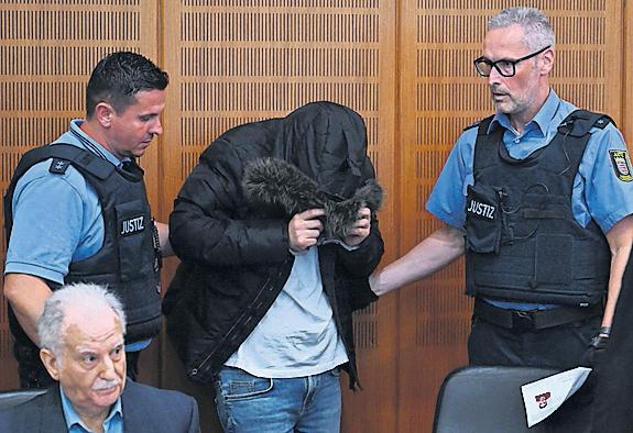 Doctor jailed for life by German court over war crimes in Syria