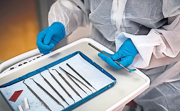 Dentists trained abroad 'flipping burgers' as they wait for UK accreditation