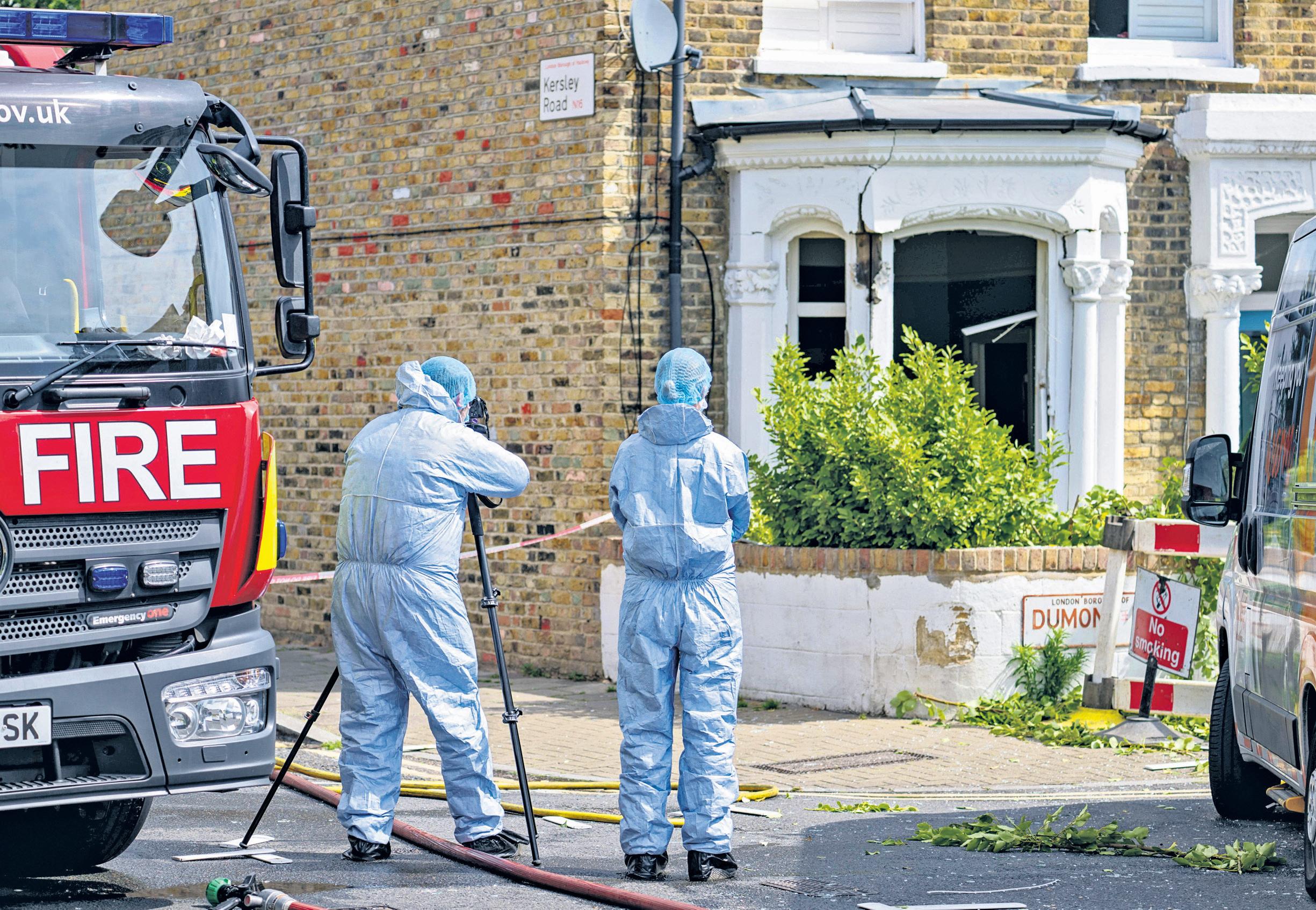 Man arrested after woman stabbed to death at scene of London gas explosion