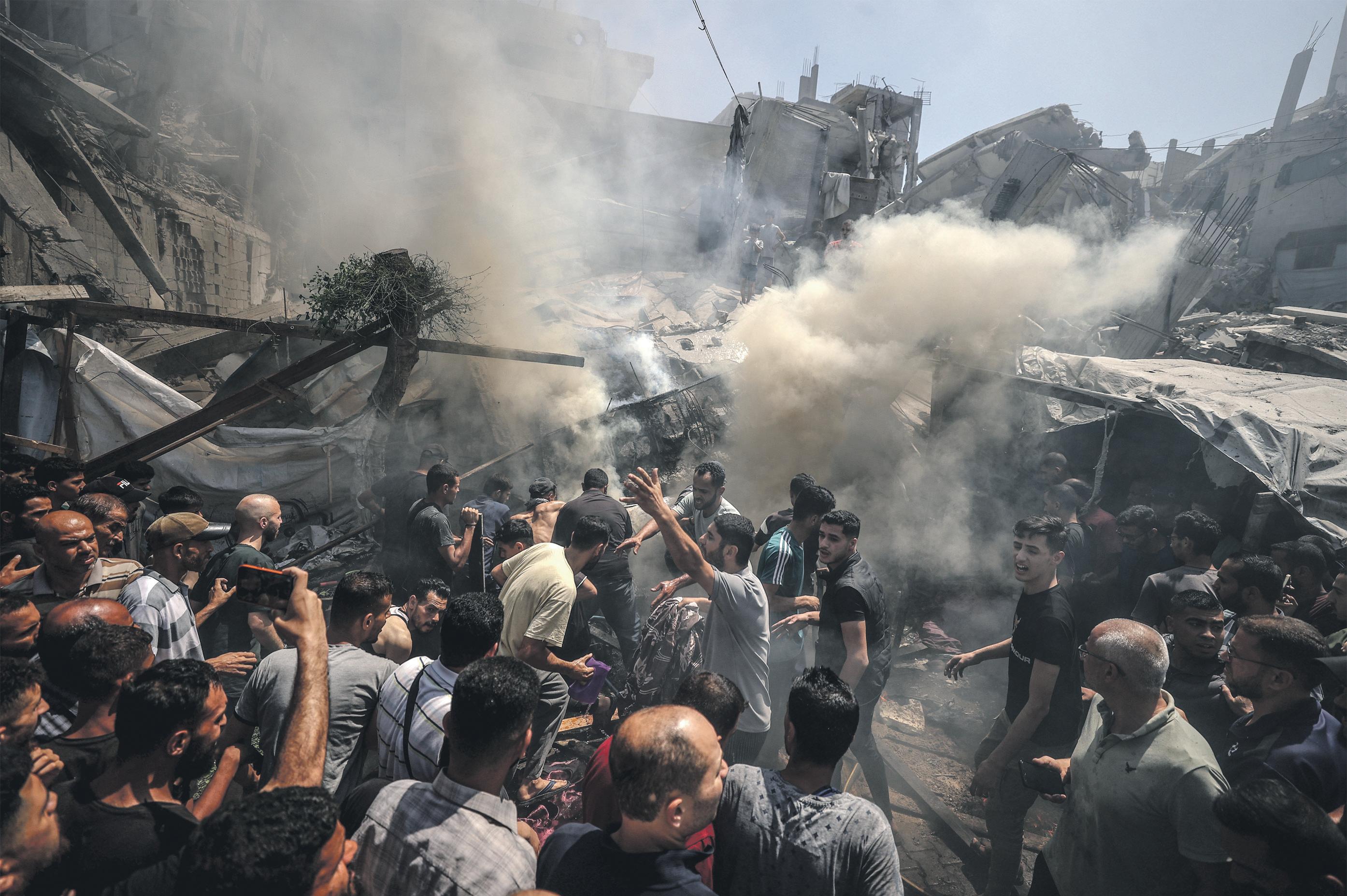 Dozens of Palestinians shot by Israeli forces at aid sites, Gaza agencies say