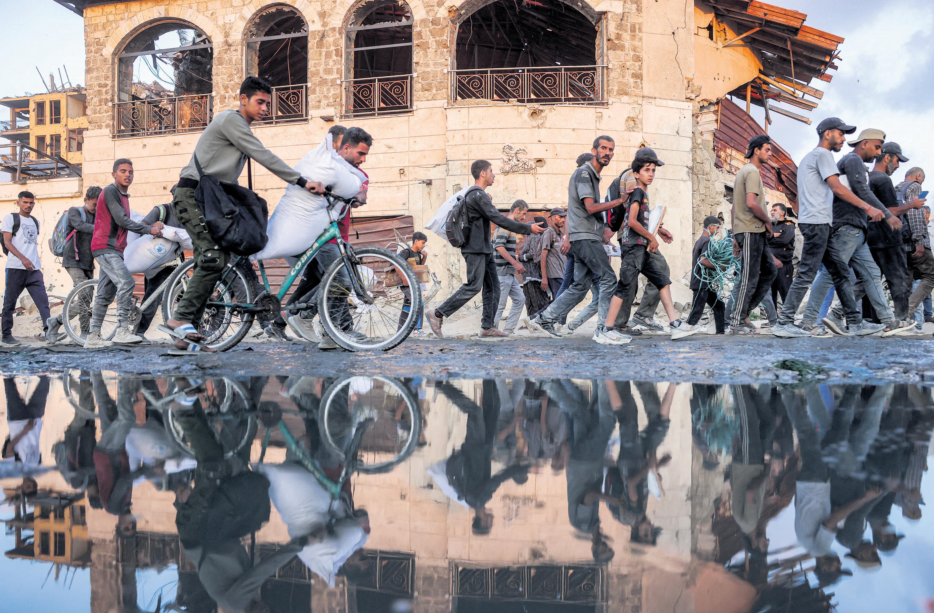 Gaza aid distribution 'As we got closer gunfire resumed, shrapnel scattered'