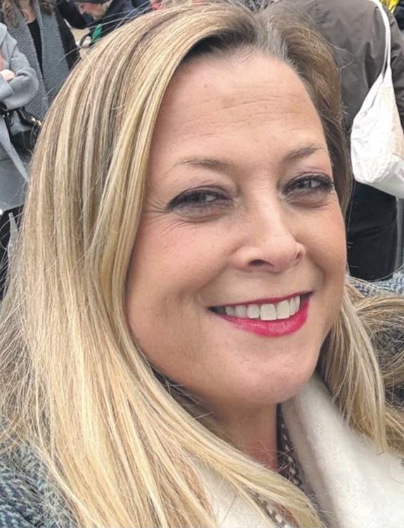 Man charged with murder after charity worker stabbed