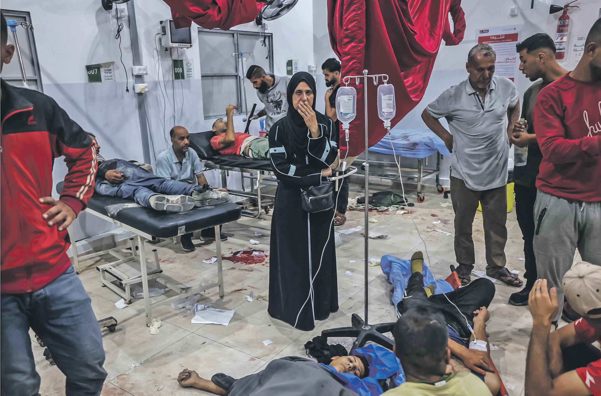 Israeli soldiers kill 40 Palestinians at food aid hubs, say medics and officials