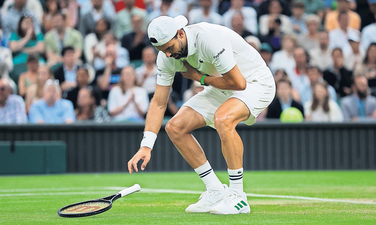 Sinner's luck turns just when needed as injury forces out Dimitrov