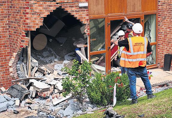 Two residents die after car in police chase crashes into care home