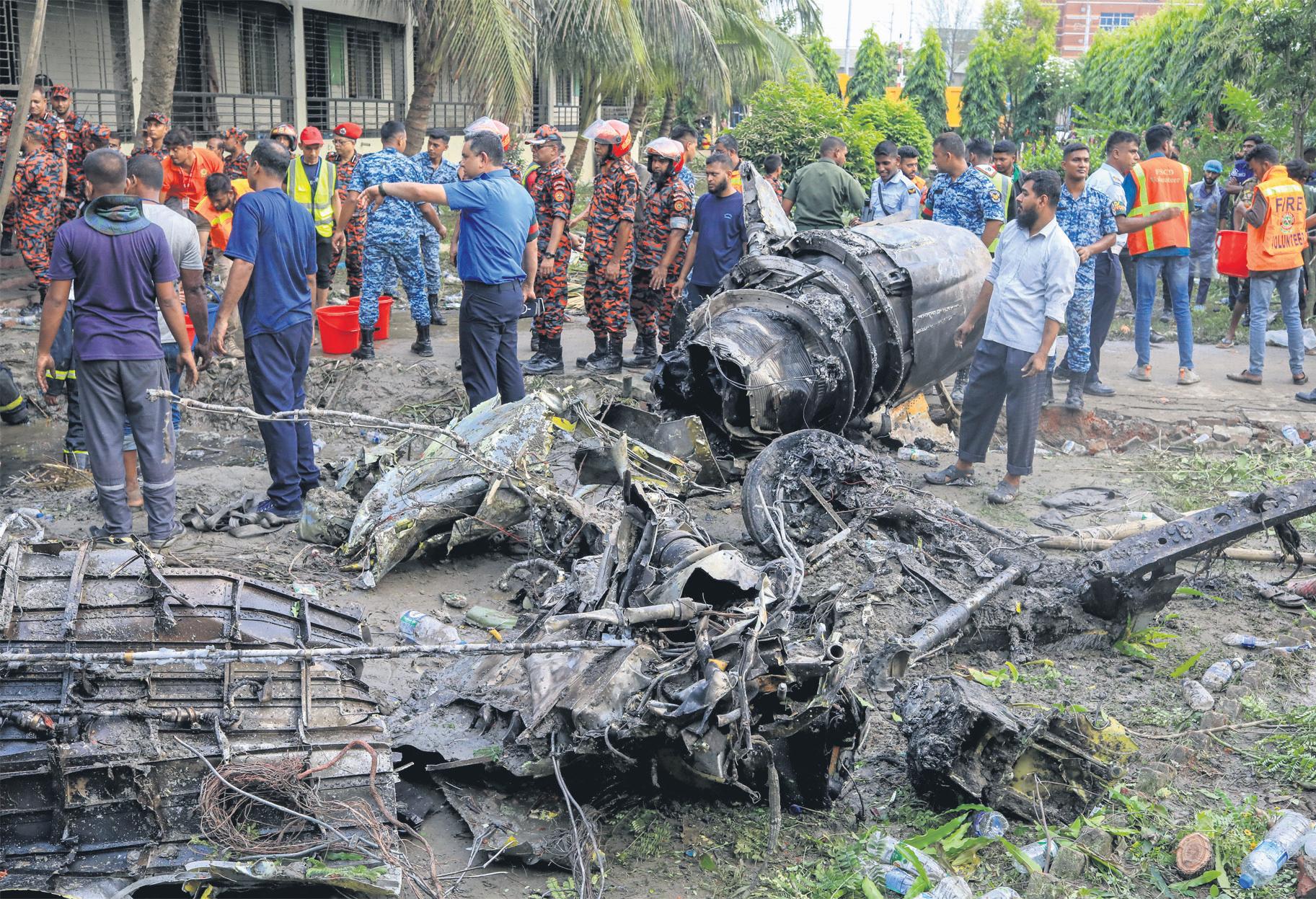 At least 20 die as fighter plane crashes on to school campus in Bangladesh