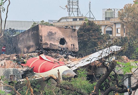 Air victims' families 'distraught' after wrong bodies flown home