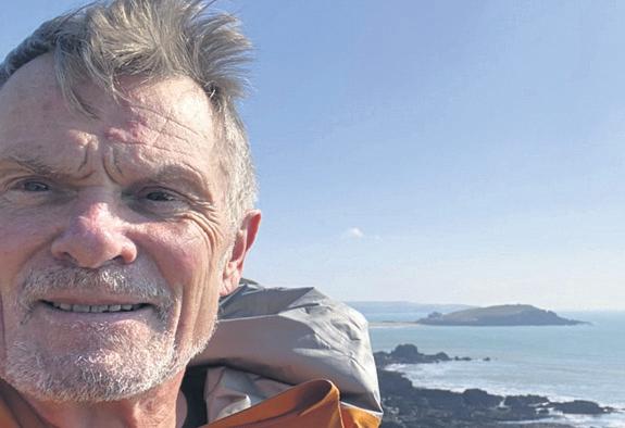 'Horrendous blisters' Retired banker takes on marathon task