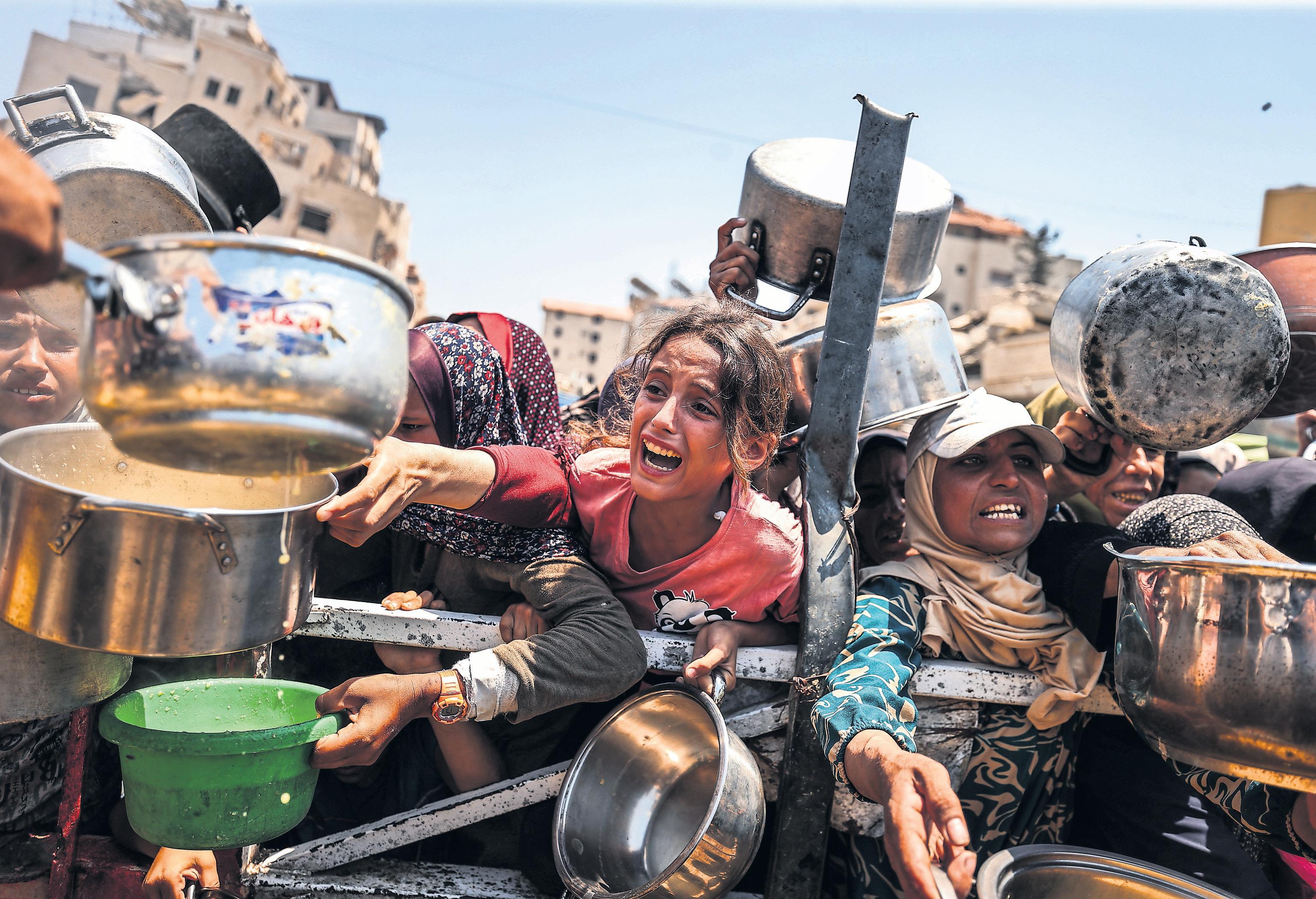 'Worst-case scenario of famine' unfolds in Gaza as death toll hits 60,000