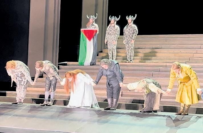 Opera protest Effort to take flag at curtain call defended by director