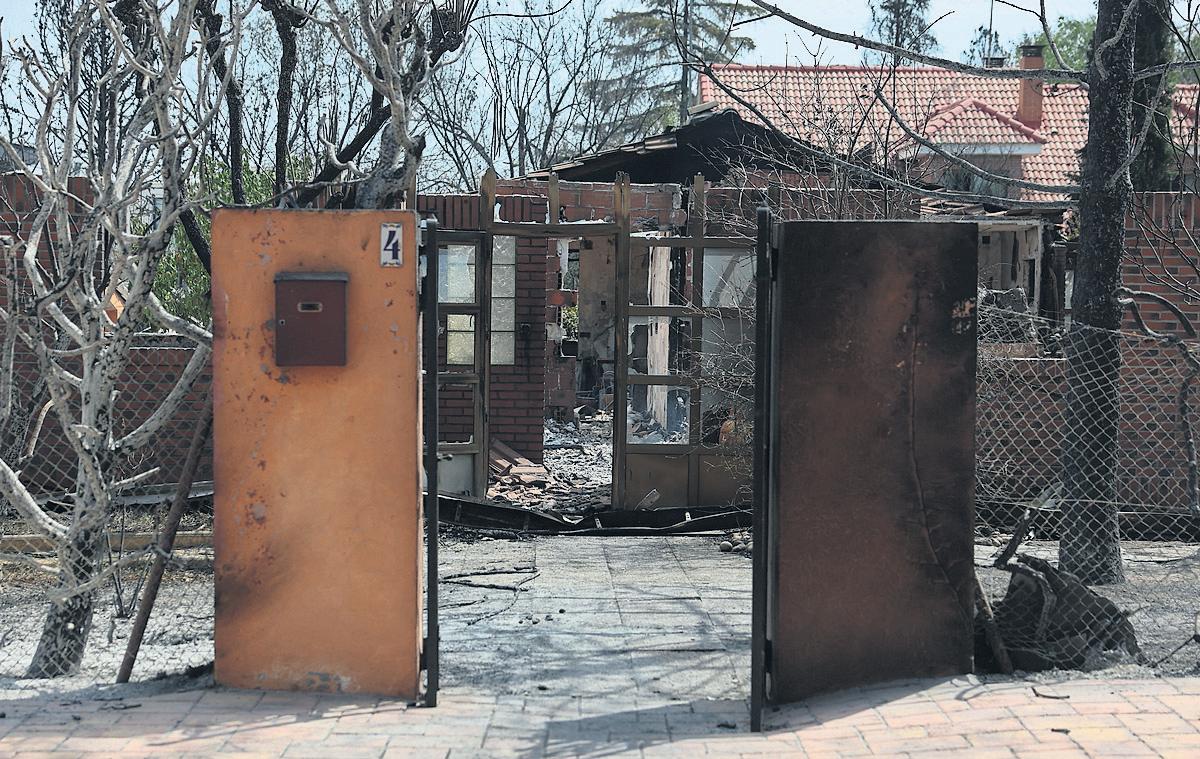 Aftermath Residents count the cost after flames swept through