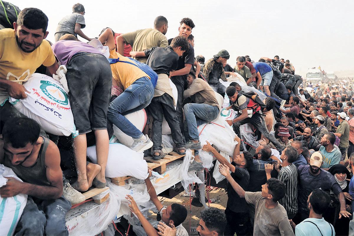 Unimaginable suffering' UK joins plea to free up aid as another 89 Palestinians killed