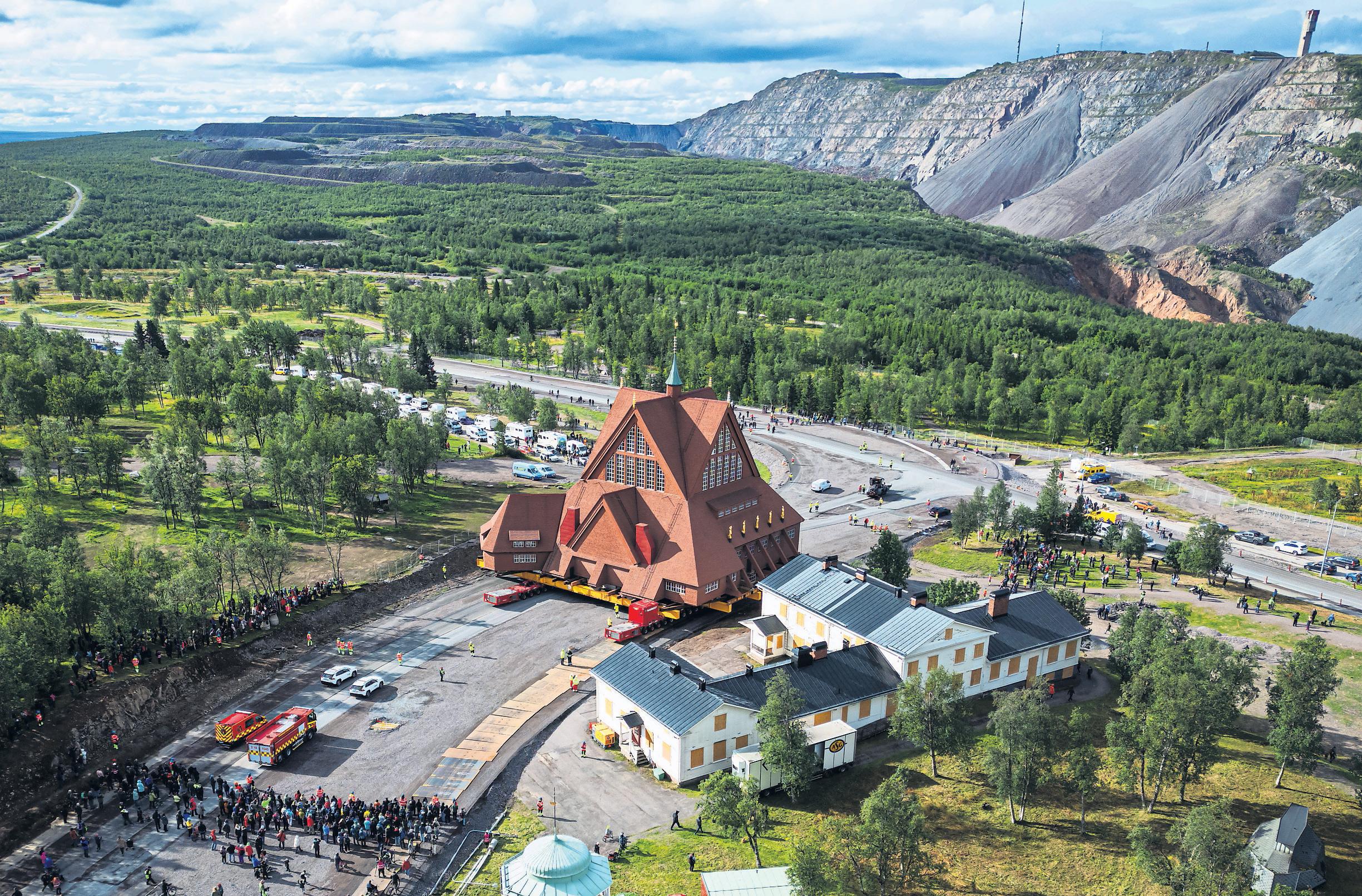 'Big church move': century-old Swedish house of worship rolls 5km to new home