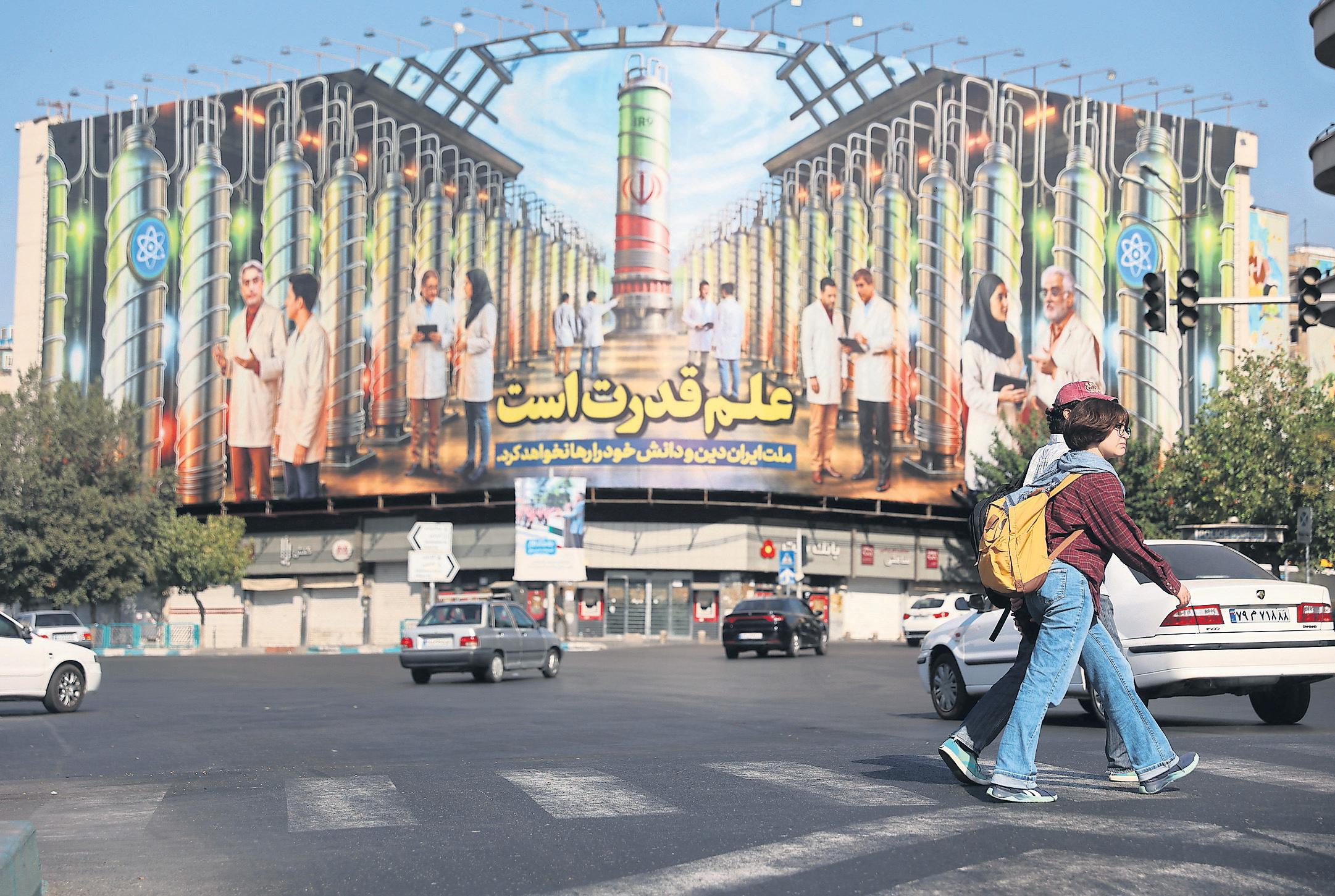 'We will choose war' Iranians defiant as they face sanctions or a second conflict