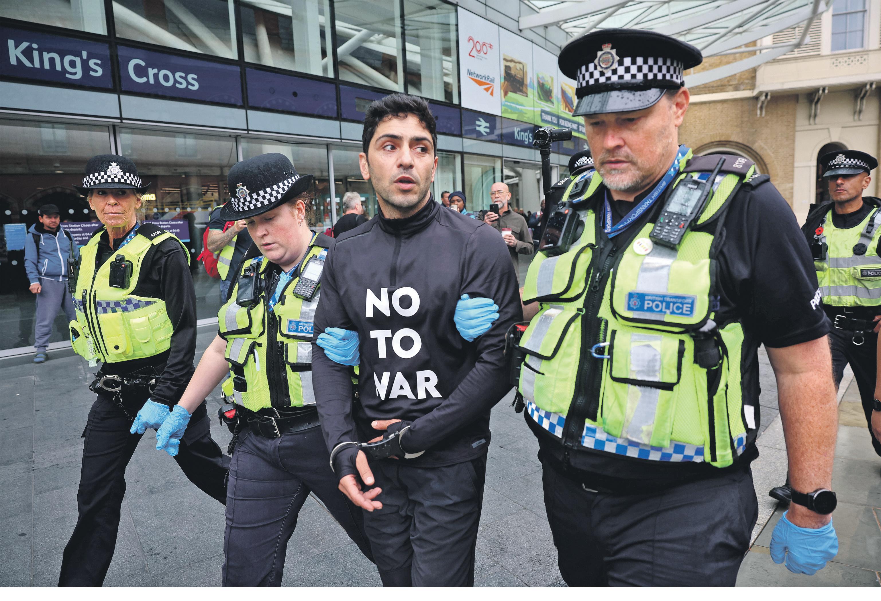 Man removed from King's Cross clock tower after Iran protest