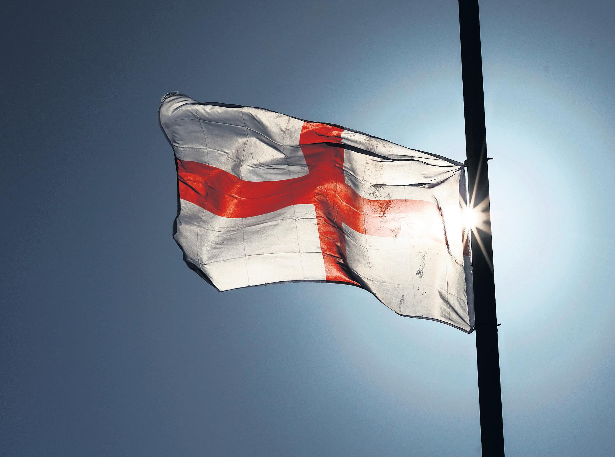 Bearing the cross Tuchel may scorn politics in sport, but his team play under the St George flag