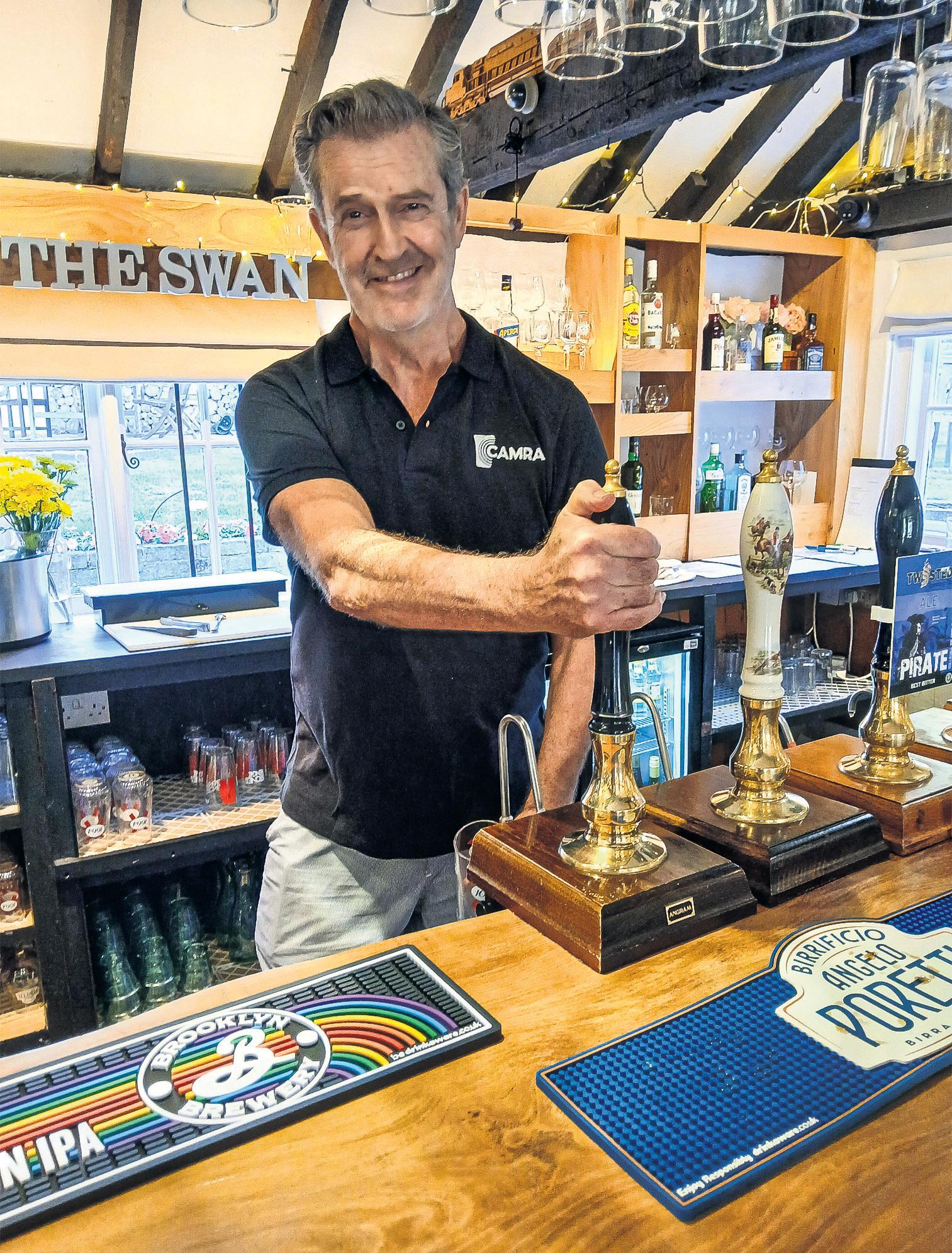 Supporting role Rupert Everett starts pulling pints to save his local pub