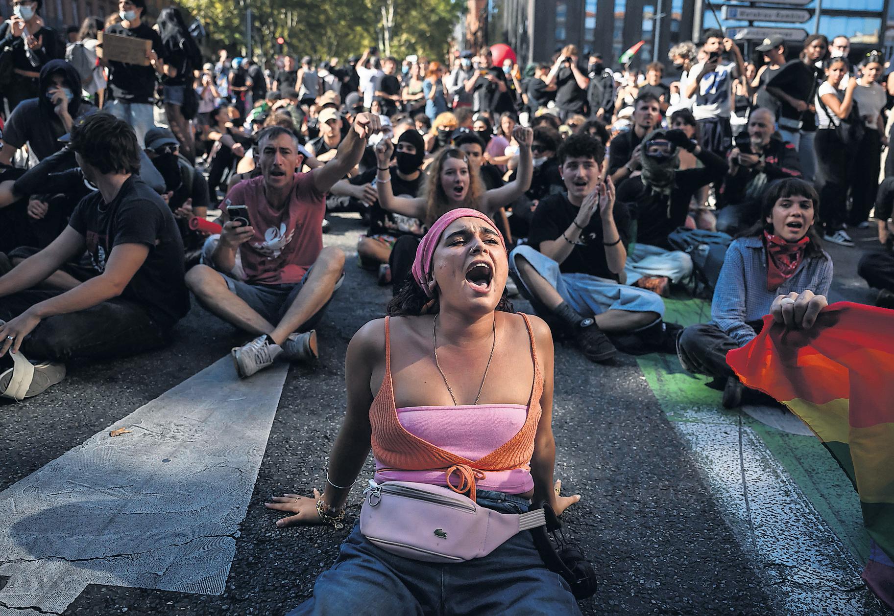 Strikes and protests across France as hundreds of thousands march against budget cuts