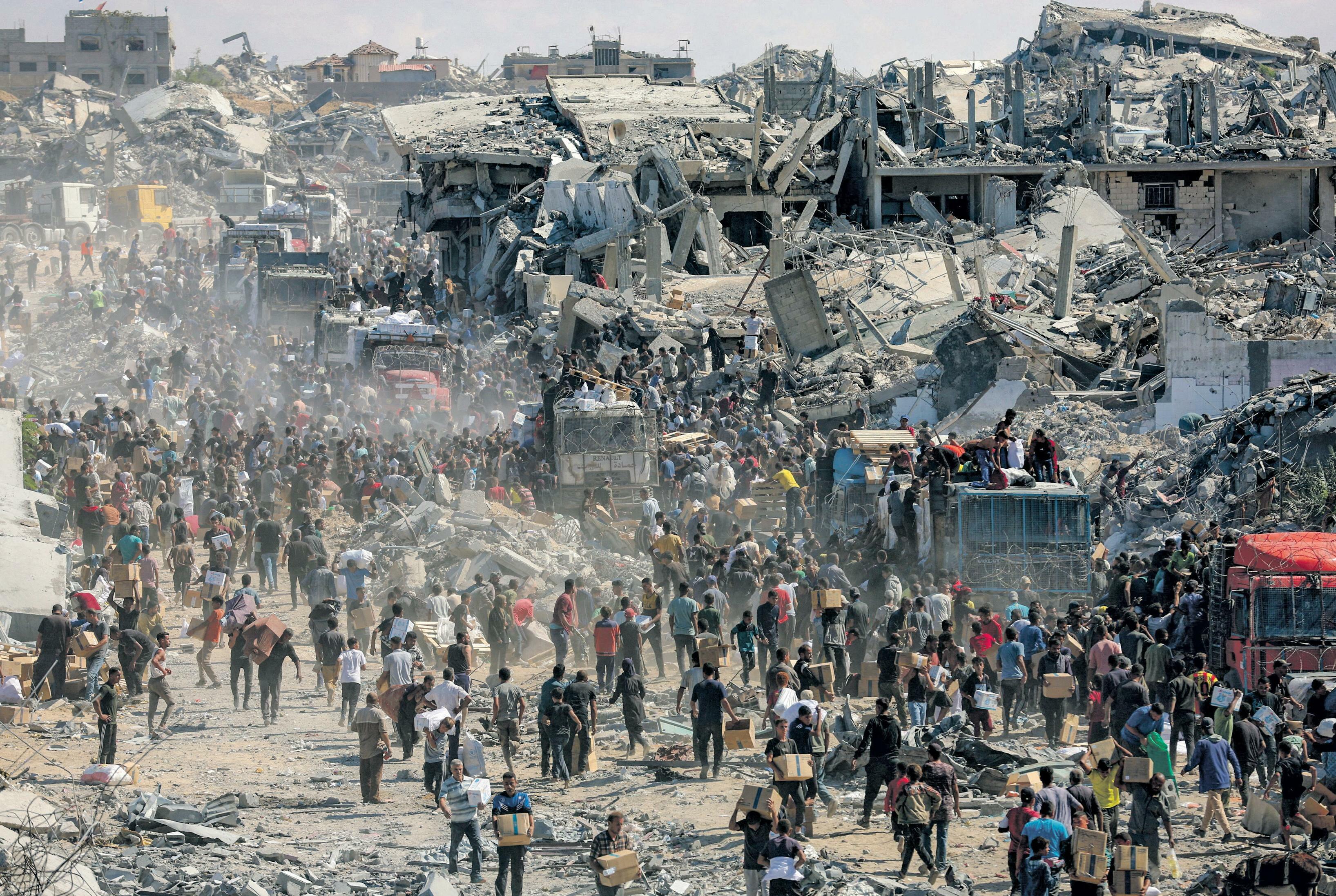 'My heart is broken' Palestinians search for loved ones amid rubble