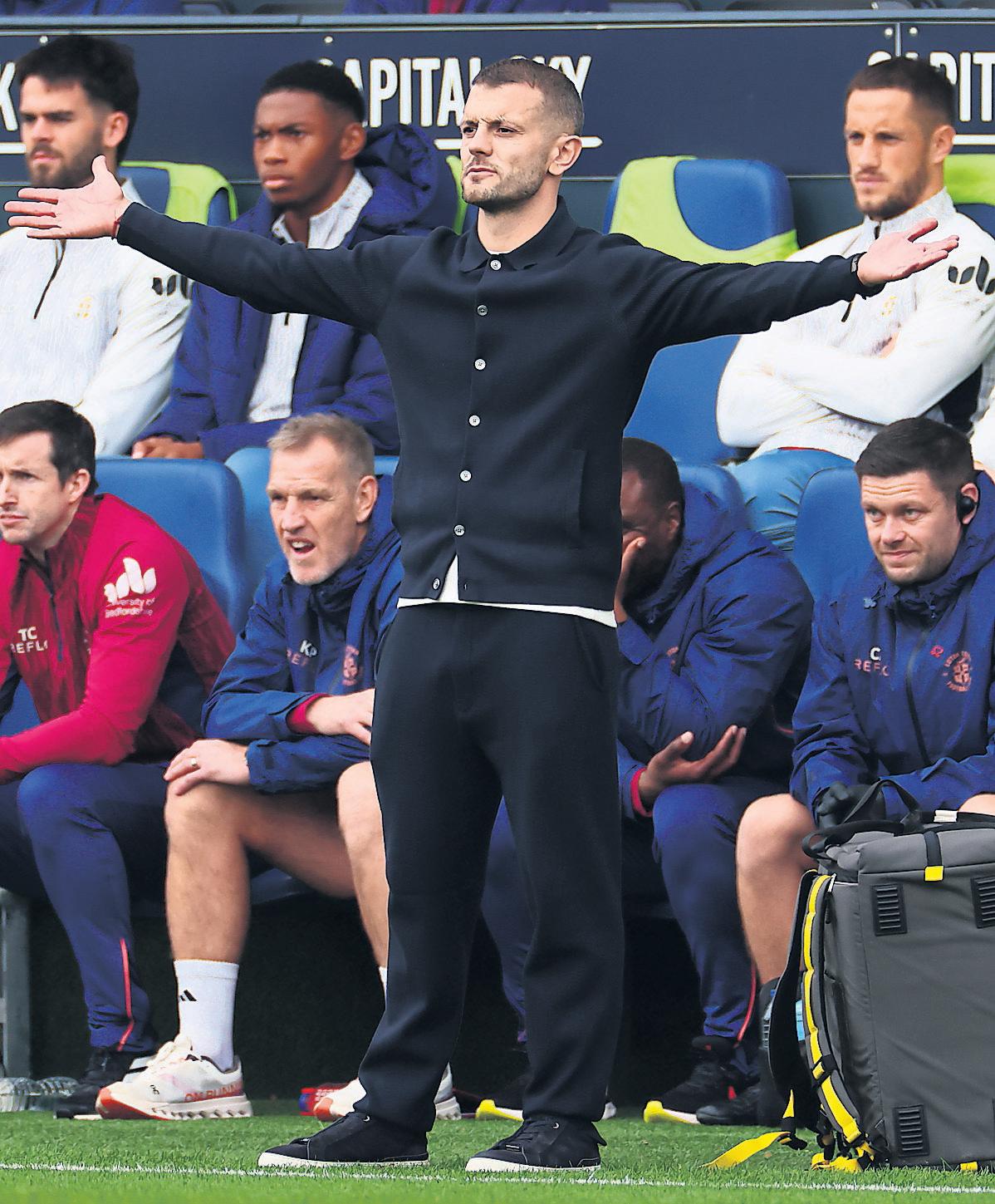 Wilshere's Luton bow ends in loss and jeers