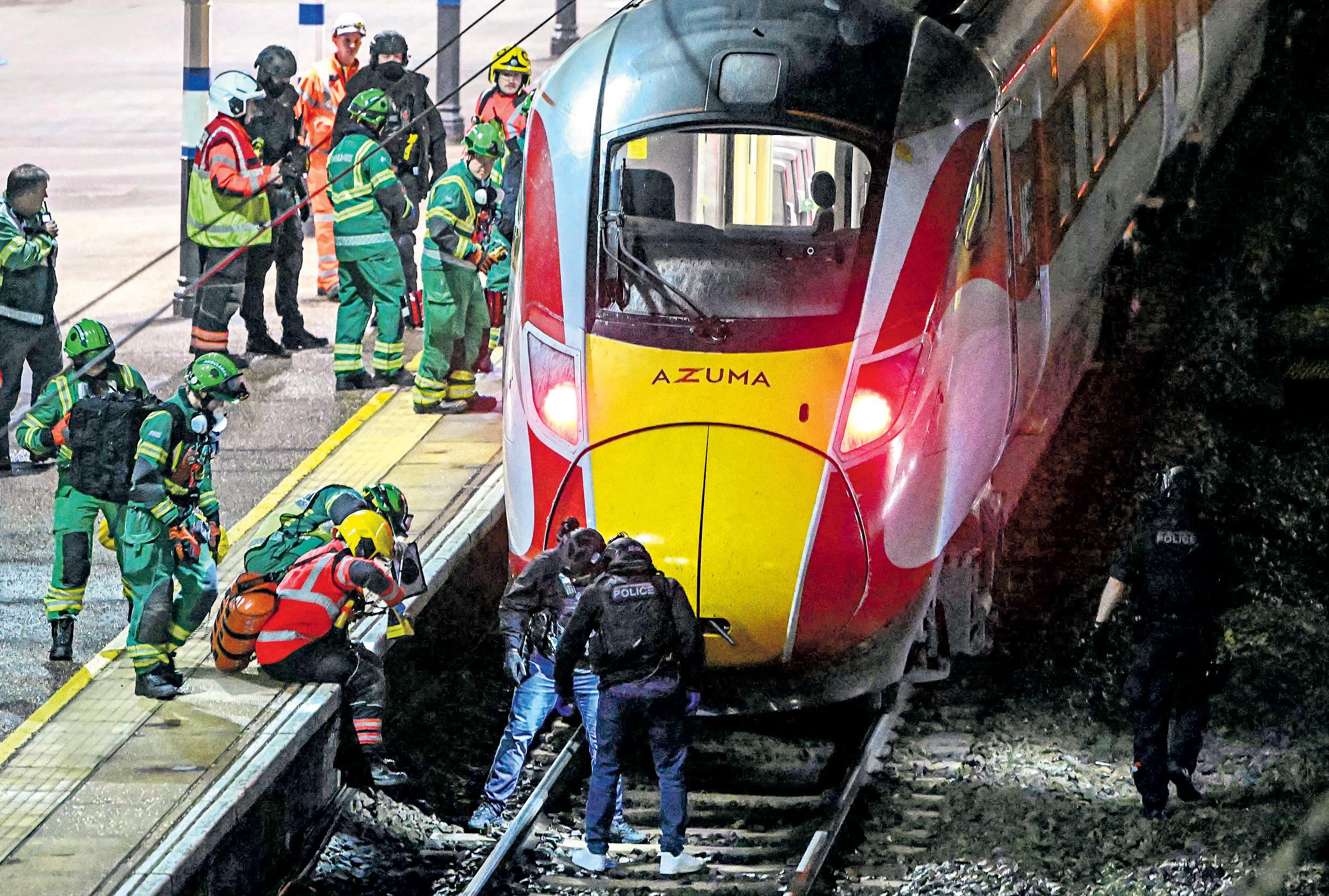 'Heroic' rail worker in fight for life after tackling train knife attacker
