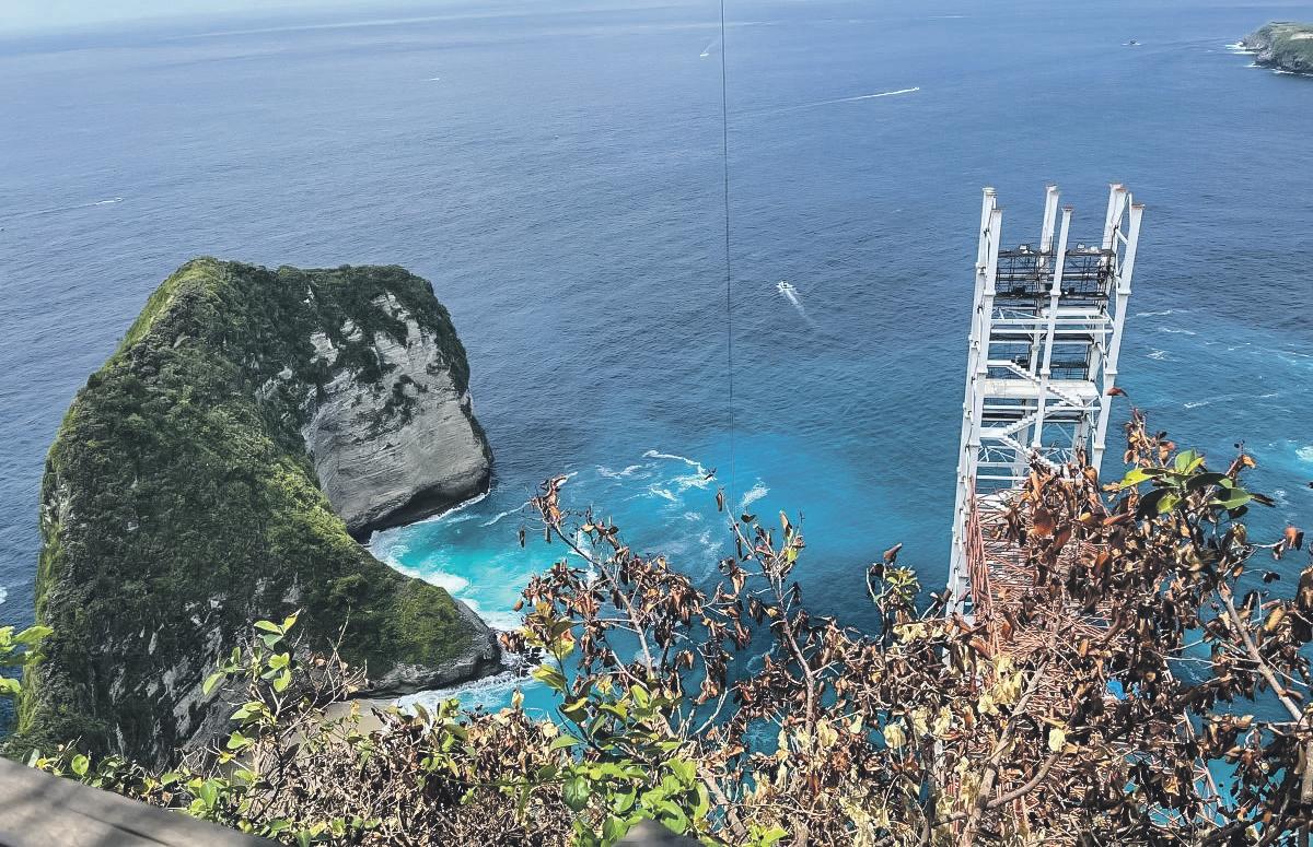 Lift with a view Anger over cliff-edge elevator that has 'destroyed' Bali beach