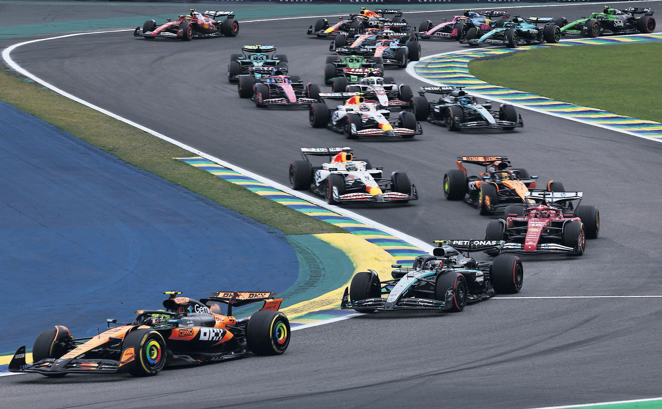 Norris wins to boost title hopes and hold off Verstappen charge