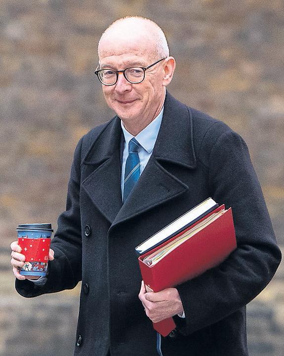 Unpaid carers to get case review after inquiry finds debts due to official errors