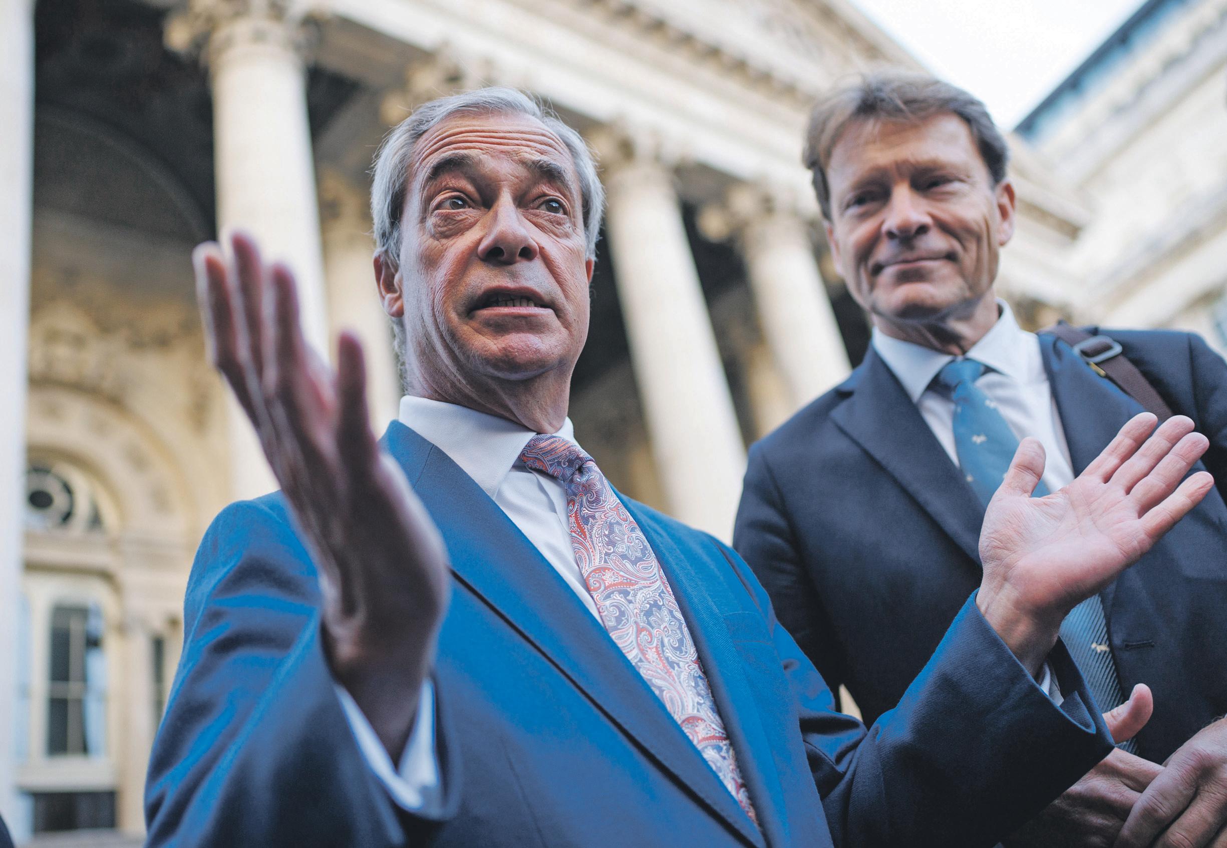 Khan says Farage racism claims are reminder of slurs he faced as child