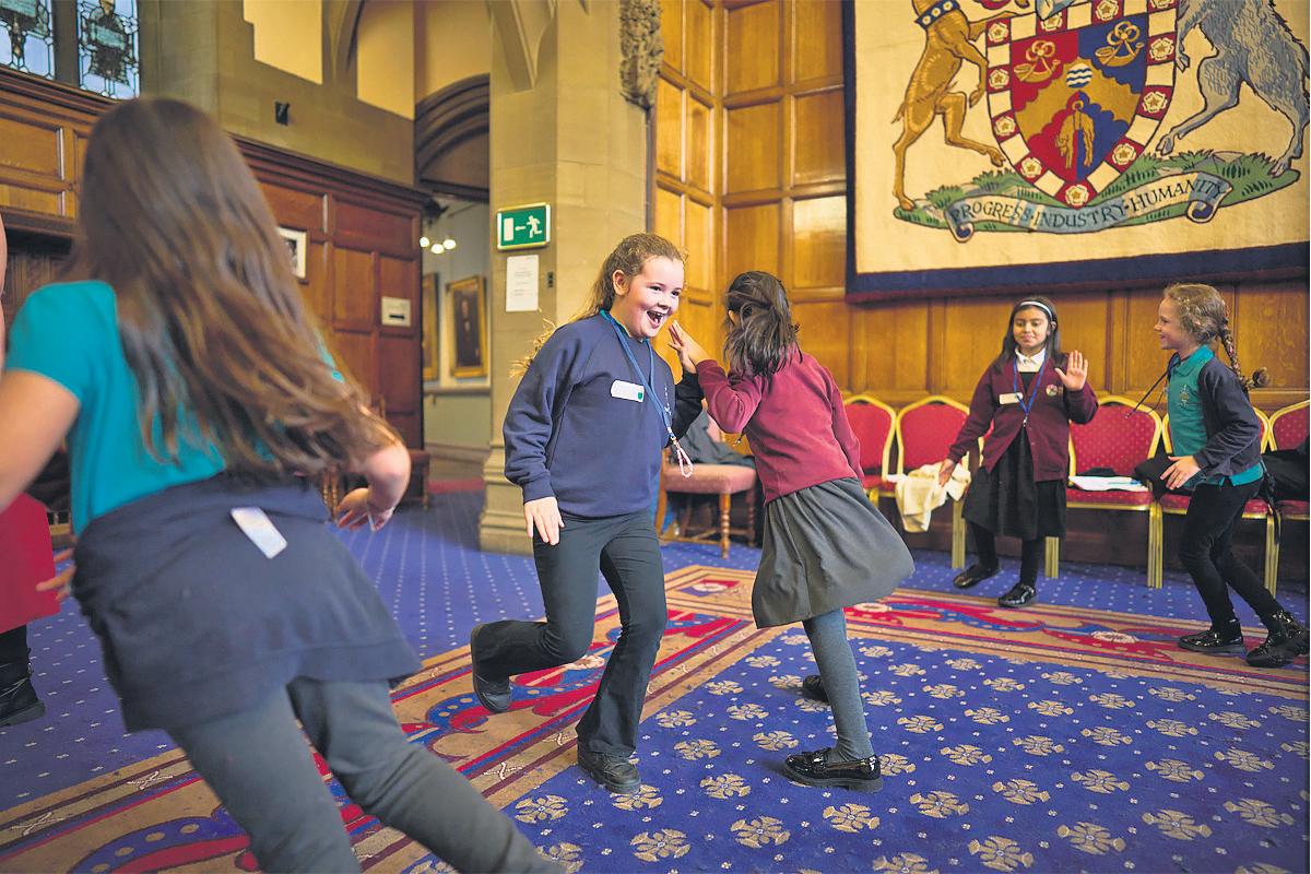 'Children don't see a difference' Pupils play through the divide