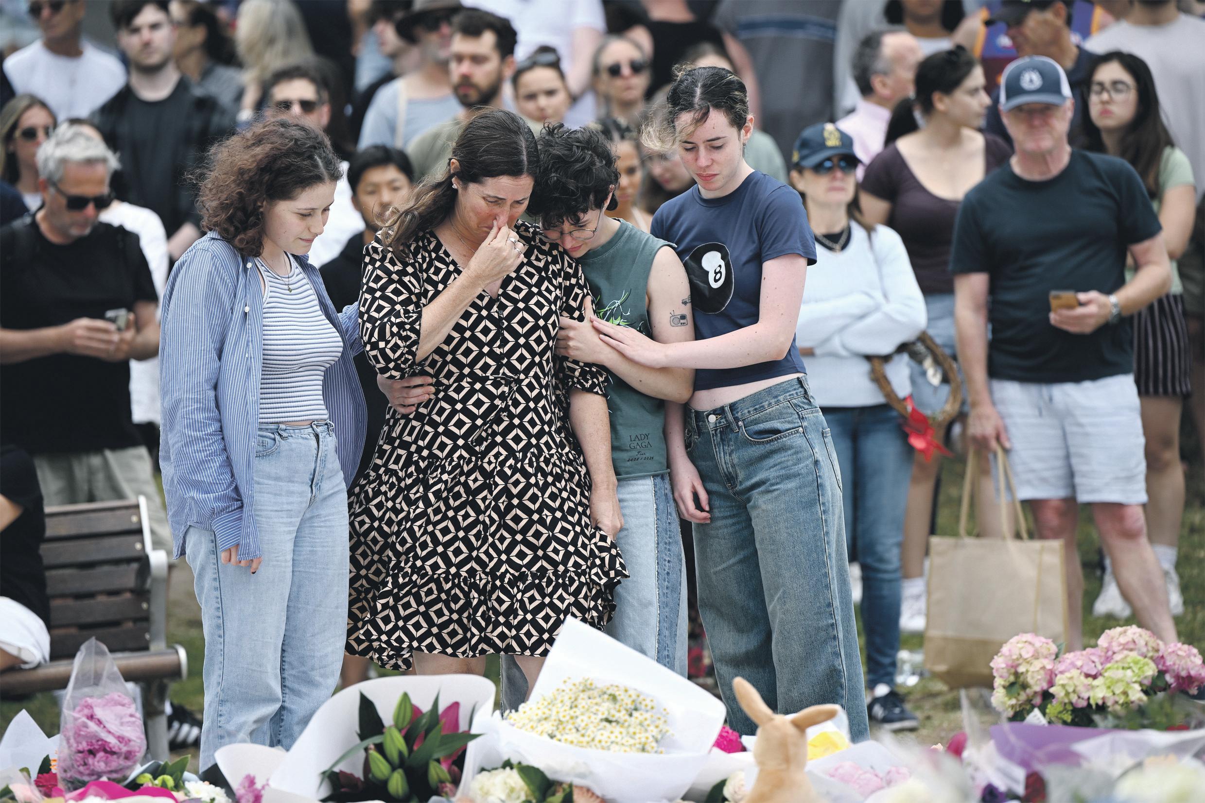 Tears, flowers and silence: Sydney unites in grief after Bondi horror