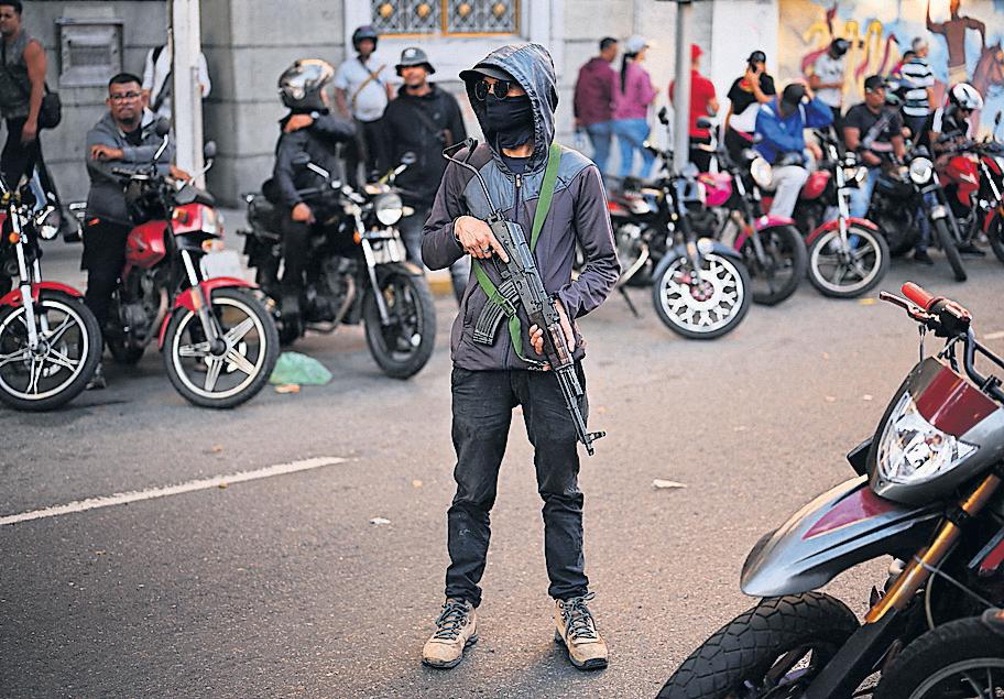 Caracas faces crackdown as rulers use militias to stifle notions of power vacuum