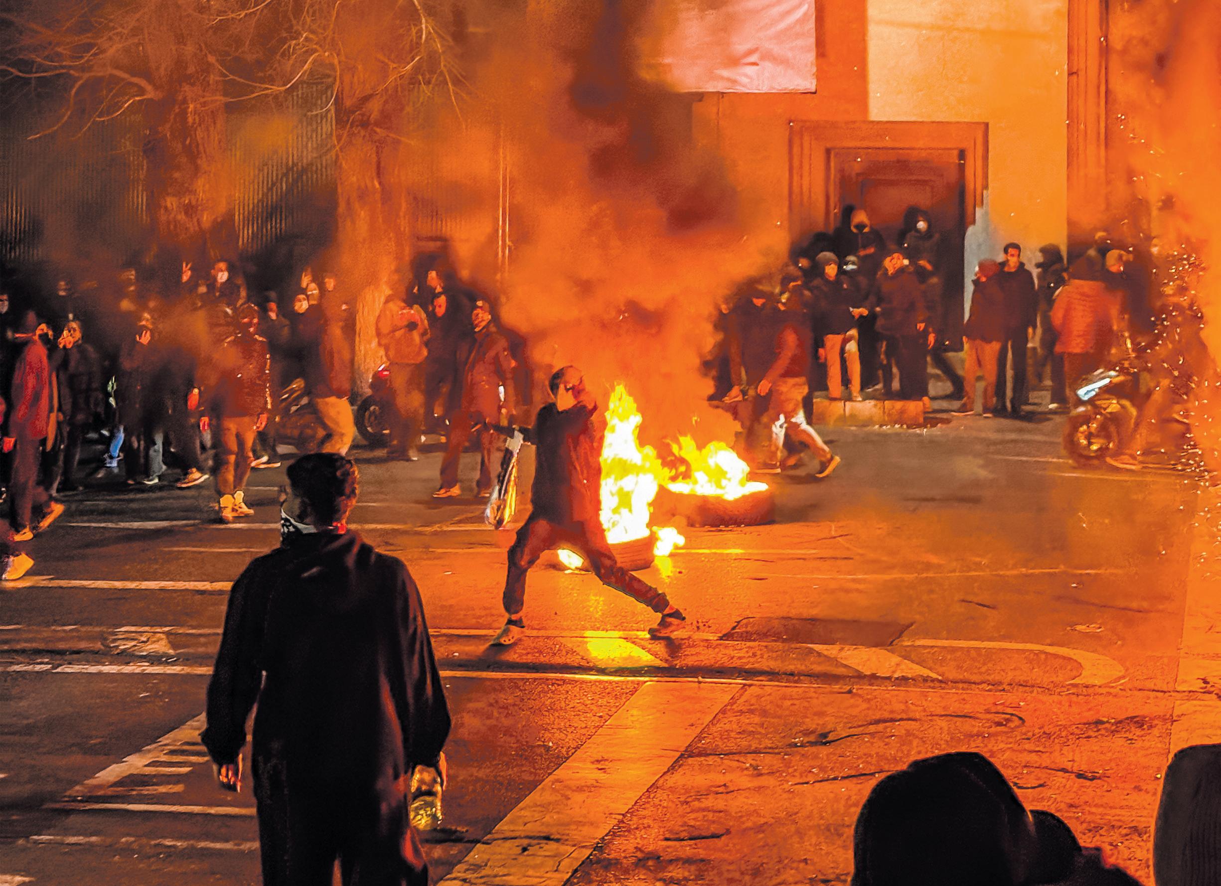 Iran warns US not to attack as protester death toll soars