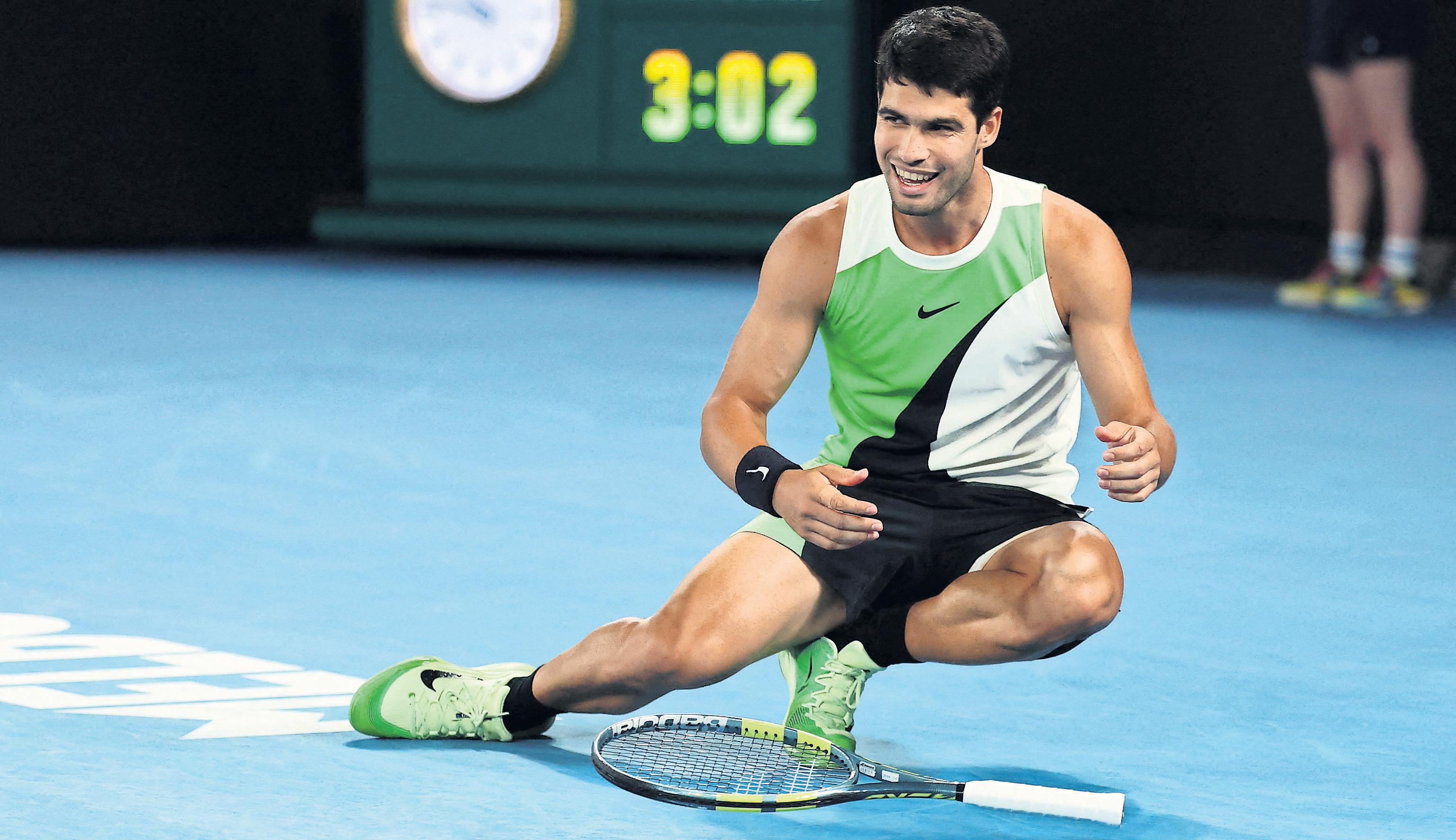 Alcaraz rallies in style to complete cherished slam