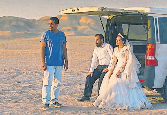 Condemning bloodshed Film's co-writer arrested