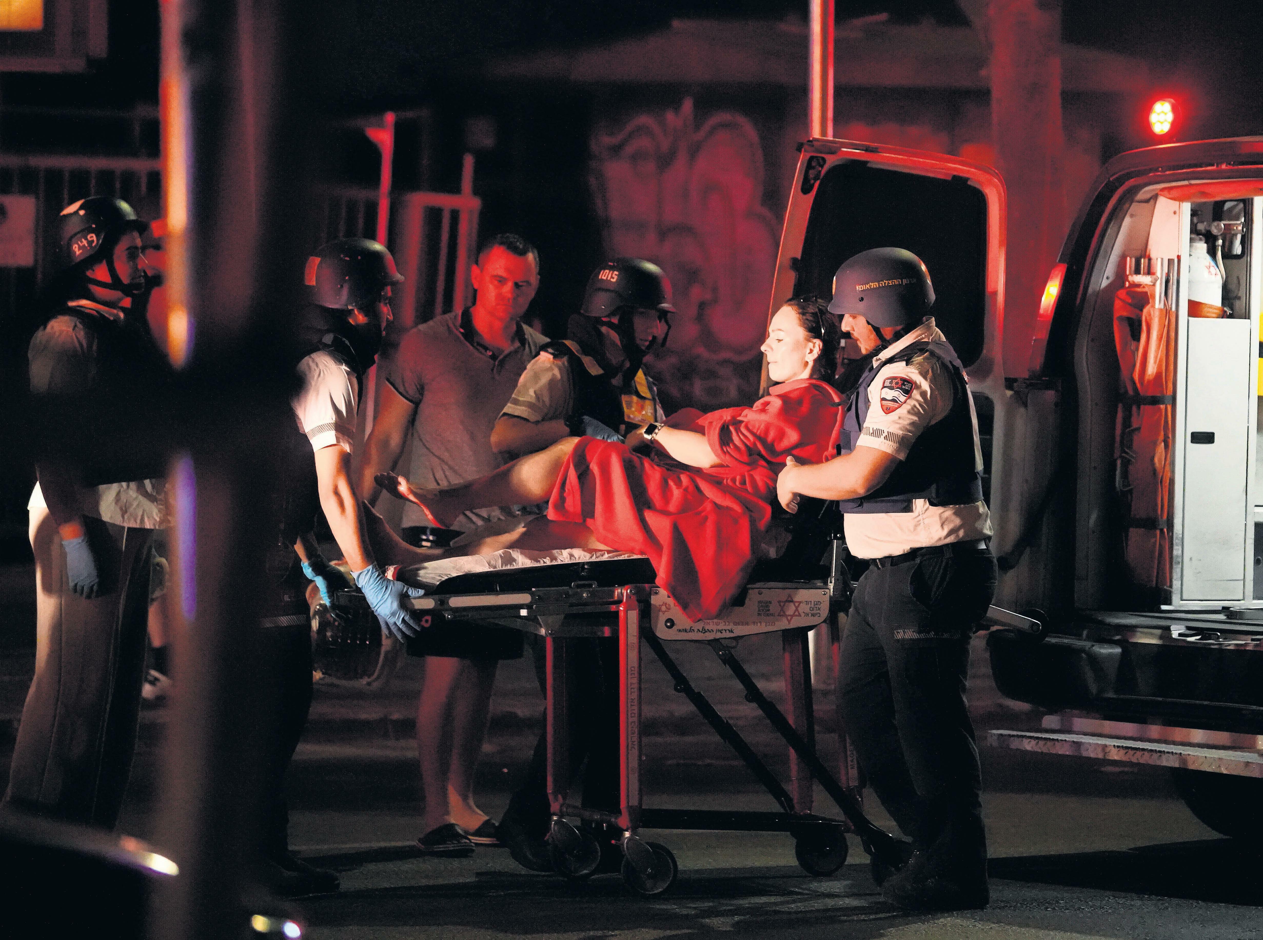 After the panic of air raids, Tehran dares to imagine life without the mulllahs