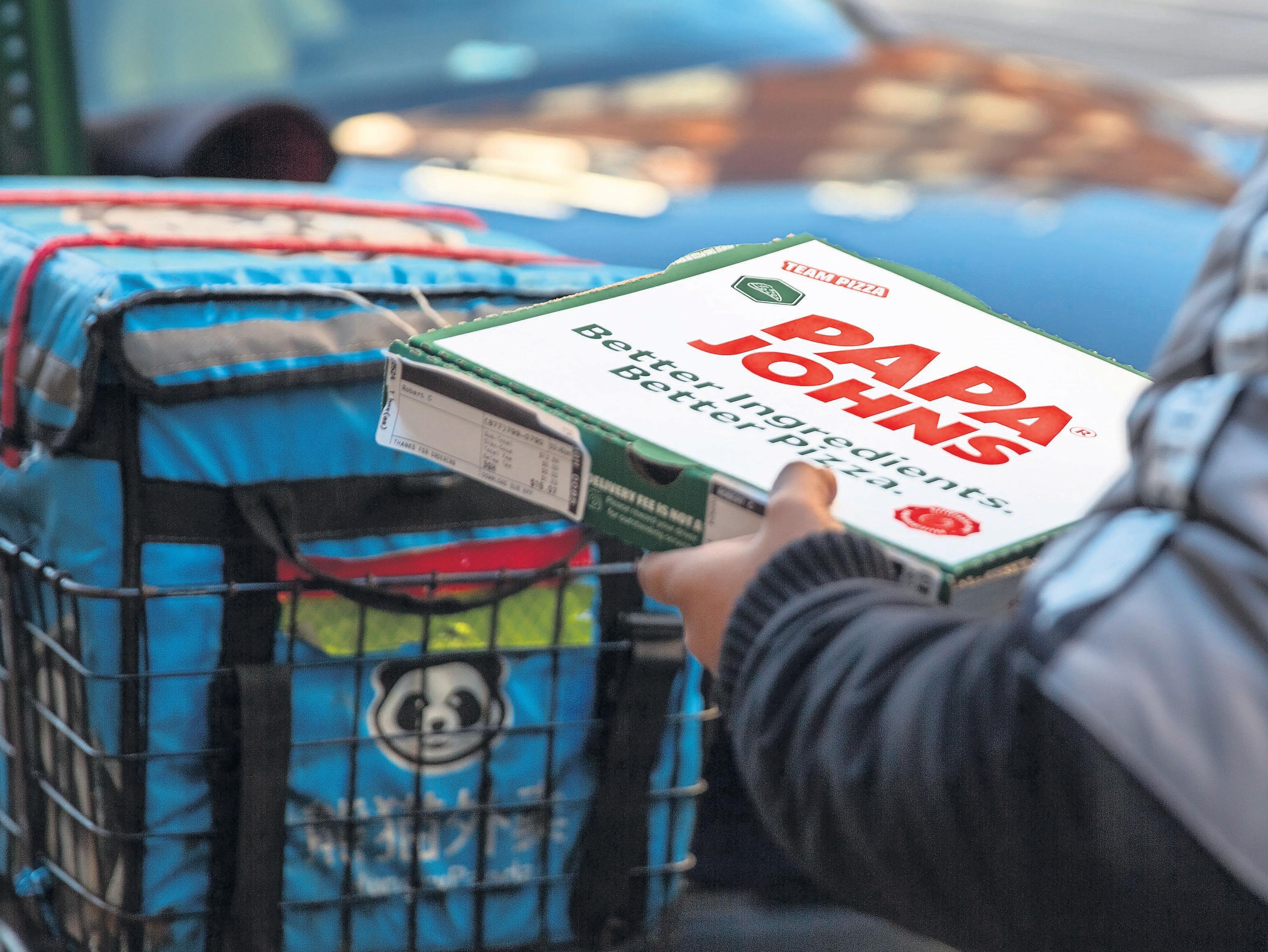 'Saviour of Papa Johns' accused of taking unlawful slice of foreign workers' pay