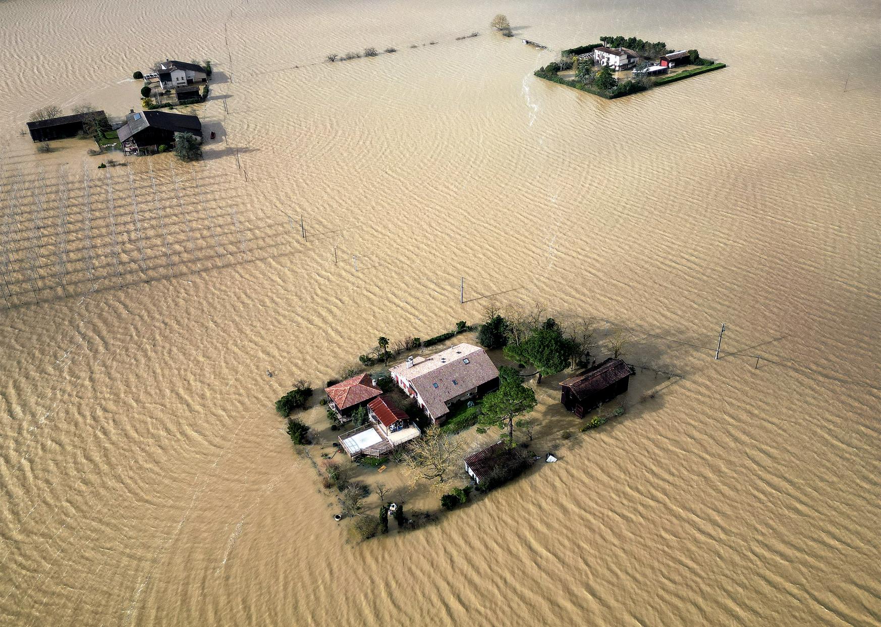 Under water: Engulfed by storms, but climate denial grows