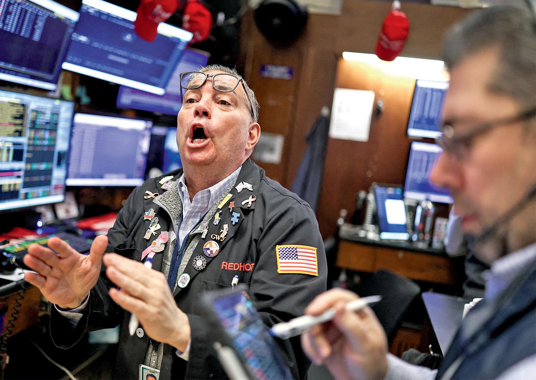 In spite of global woes, why is Wall Street still booming?