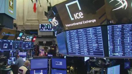 Wall Street rises to record high after unemployment rate improves
