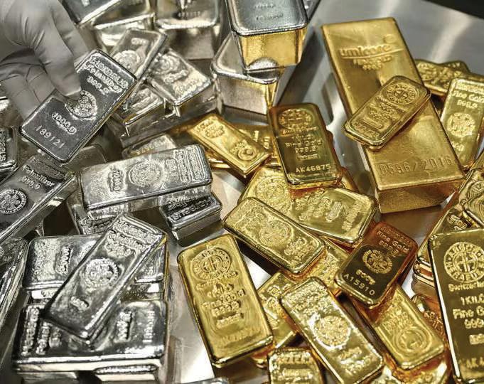GOLD, SILVER PRICES SNAP RECORD RALLY AMID FED NOMINATION