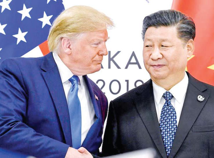 China shows no sign of backing down amid 100% tariff threat